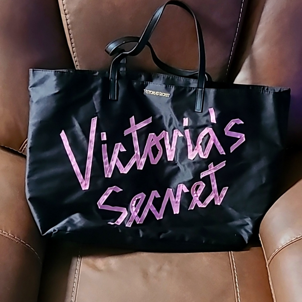 Victoria's Secret tote with ribbon stitched logo across front, gently used.